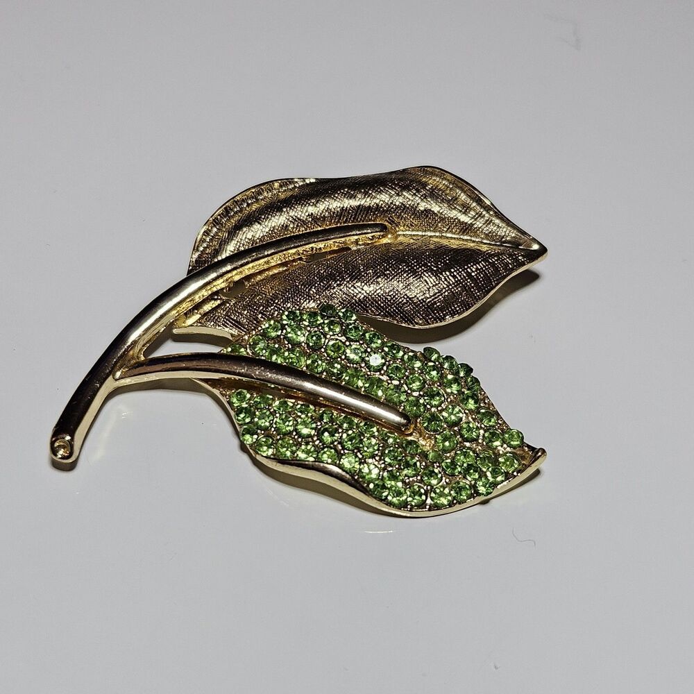 Vintage Gold Tone Green Rhinestone Double Leaf Textured Brooch